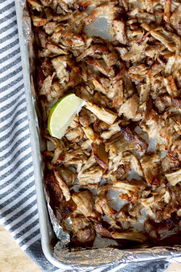 Carnitas for a crowd are crispy and full of flavor - plus, they make a great meal for a crowd since you can customize things to please anyone!