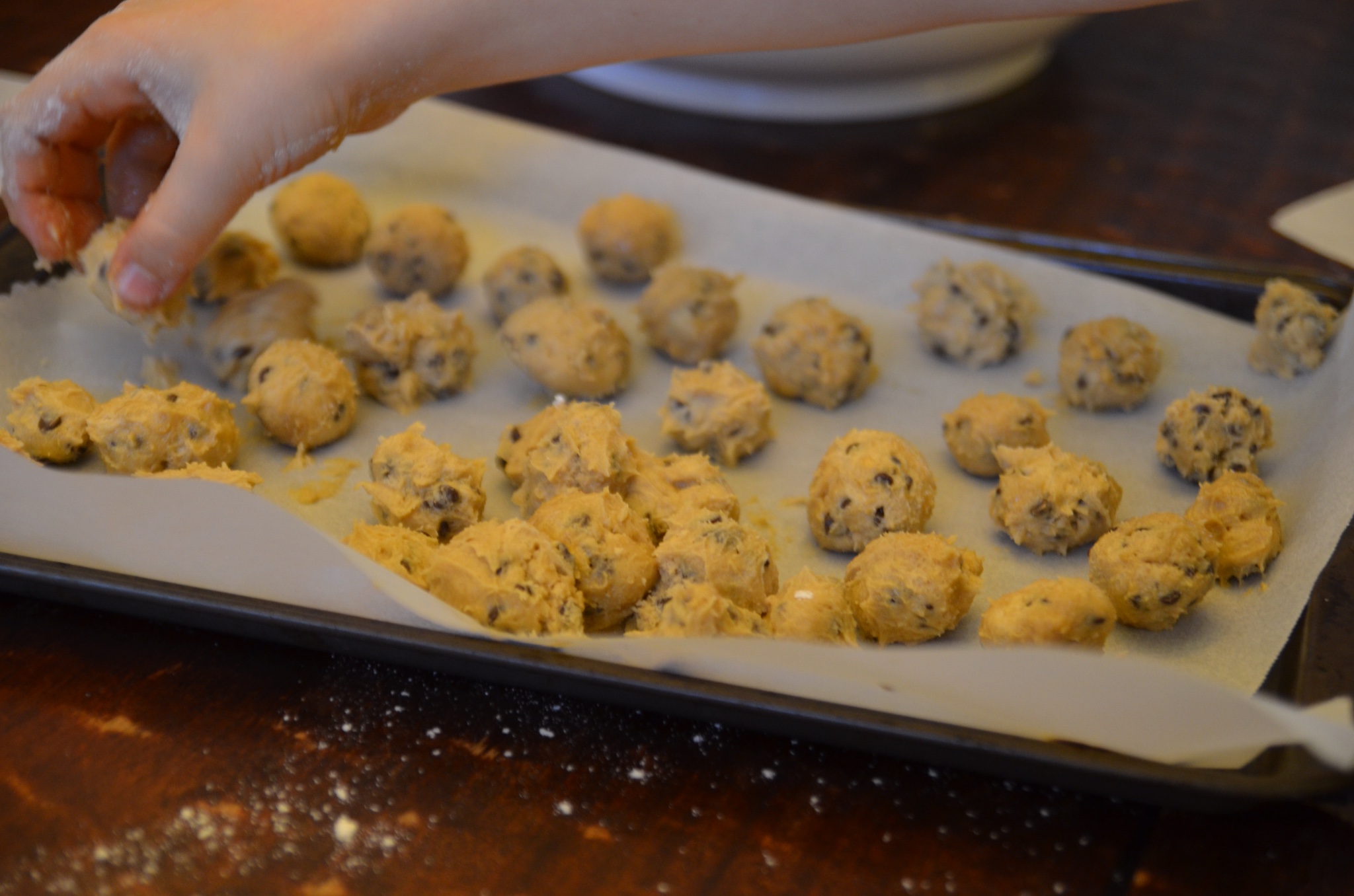 cookie dough truffles ready to be chilled in the freezer before dipping