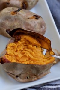 gorgeous orange baked sweet potato mashed right in the skin