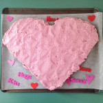 heart-shaped cake with natural, dye-free pink icing