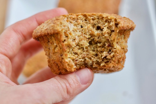 whole wheat banana bran muffin showing the light, tender inside and the toasty brown outside