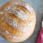Crusty no-knead bread is easy to make but incredibly satisfying with its crackling crust and soft, chewy inside - perfect with a swipe of salty honey butter!