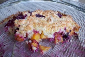 blueberry peach cobbler in the pan
