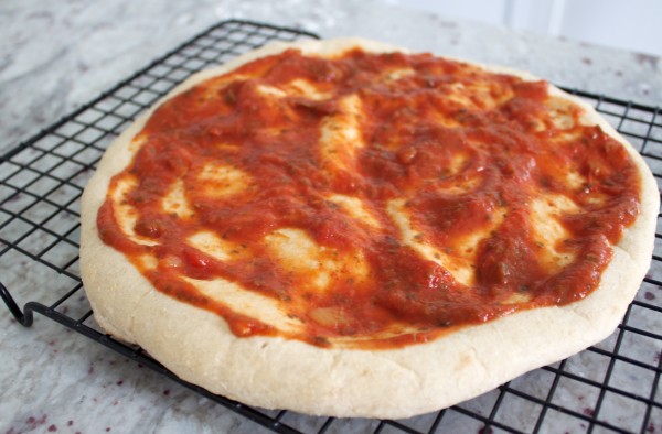 sauce on homemade frozen pizza