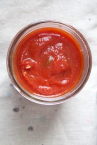 The fresh taste of this simple basil marinara has just a few ingredients, takes about 20 minutes to make, and is the perfect thing to stash in the freezer!