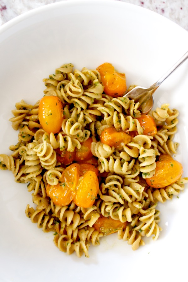 Quick and full of summer flavor, pesto pasta with burst tomatoes is easy and delicious.