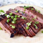 Soy sauce and honey marinated flank steak is simple, juicy, and flavorful thanks to hints of garlic and ginger.