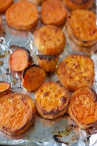 a pan of perfectly toasty, roasted sweet potatoes for veggie-packed taco bowls with roasted sweet potatoes