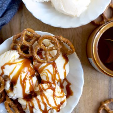 Salted caramel pretzel sundaes are the perfect sweet/salty/crunchy ice cream treat! Somehow pretzels + ice cream = waffle cone in your brain.