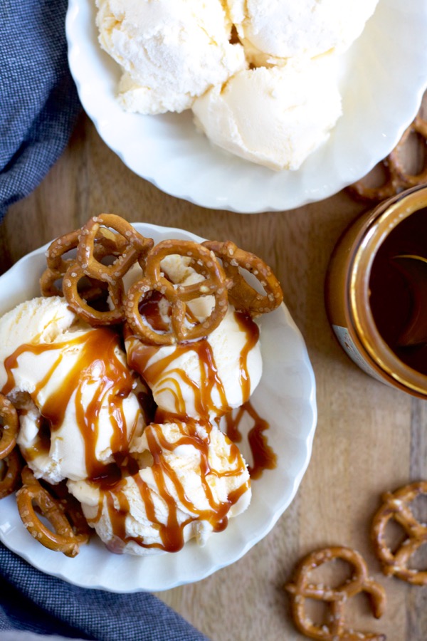 Salted caramel pretzel sundaes are the perfect sweet/salty/crunchy ice cream treat! Somehow pretzels + ice cream = waffle cone in your brain.