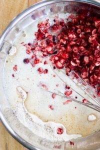 Mixing the batter for fresh cranberry bread.