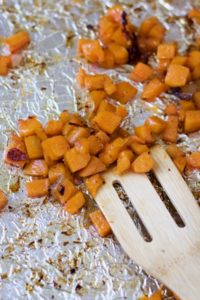 roasted butternut squash with onions close-up